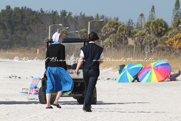 Amish Couple Walking on the Beach